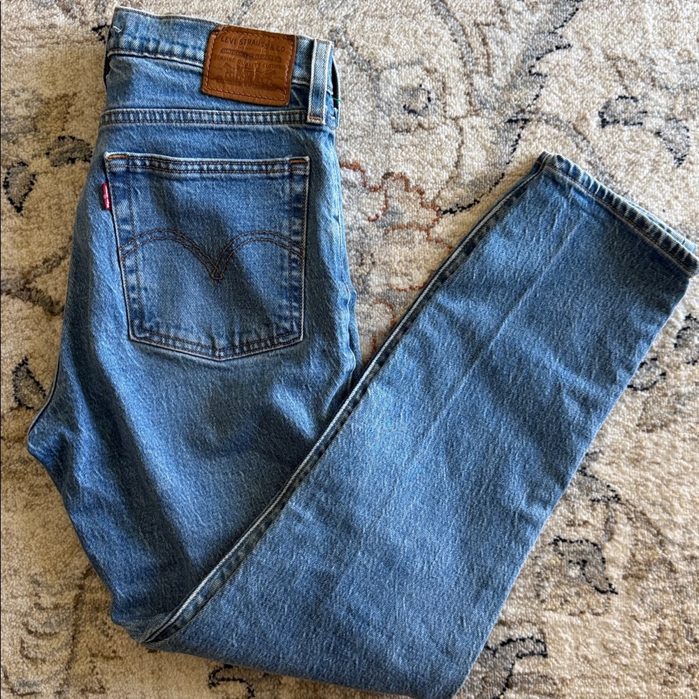Levi's 501 Original Fit jeans with a classic blue wash, straight fit